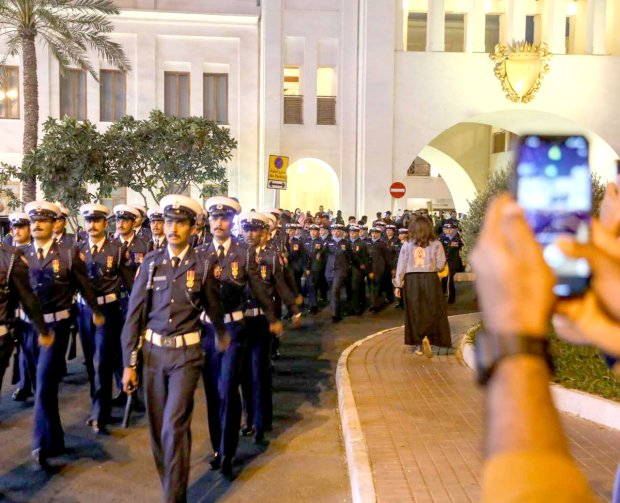 <p><em><strong>Officers in the parade</strong></em></p><div class="explain-selected-button explain-selected-circle"></div><style>
.explain-selected-button.explain-selected-text-selected-show-button {
  display: block !important;
}

.explain-selected-button.explain-selected-expanded {
  width: 400px;
  border: 0px;
  cursor: default; 
  height: 350px; 
  overflow: auto;
  box-shadow: rgba(15, 15, 15, 0.05) 0px 0px 0px 1px, rgba(15, 15, 15, 0.1) 0px 3px 6px, rgba(15, 15, 15, 0.2) 0px 9px 24px;
}

.explain-selected-button.explain-selected-circle:not(.explain-selected-expanded) {
  width: 35px;
  height: 35px;
  background: transparent;
  border-radius: 50%;
  opacity: 0.5;
}
.explain-selected-button.explain-selected-circle:not(.explain-selected-expanded):hover::before {
  content: "";
  position: absolute;
  width: 35px;
  height: 35px;
  background-color: rgba(128, 0, 128, 0.5);
  border-radius: 50%;
  top: 50%;
  left: 50%;
  transform: translate(-50%, -50%);
  animation: explain-selected-growAndFade 2.0s ease-in-out;
  animation-iteration-count: infinite;
}

.explain-selected-button.explain-selected-circle:not(.explain-selected-expanded)::after {
  content: "";
  position: absolute;
  width: 10px;
  height: 10px;
  background-color: rgb(128, 0, 128);
  top: 50%;
  left: 50%;
  transform: translate(-50%, -50%);
  border-radius: 50%;
}
.explain-selected-button.explain-selected-circle:not(.explain-selected-expanded):hover::after {
  width: 14px;
  height: 14px;
}

@keyframes explain-selected-growAndFade {
  0% {
    width: 10px;
    height: 10px;
    opacity: 1;
  }
  100% {
    width: 30px;
    height: 30px;
    opacity: 0;
  }
}

.explain-selected-button {
  display: none !important;
  width: 120px;
  height: 28px;
  border-radius: 4px;
  border: 0px;
  position: absolute;
  z-index: 9999;
  opacity: 1;
  cursor: pointer;
  background: white;
  text-align:left;
  font-family: Tahoma,Arial,Helvetica Neue,Helvetica,sans-serif; 
  background-color: #fff;
  color: #333;
}

.swal2-icon-show-explainselected {
  border: none;
}

.swal2-container p {
  margin: 0 !important;
}

</style>